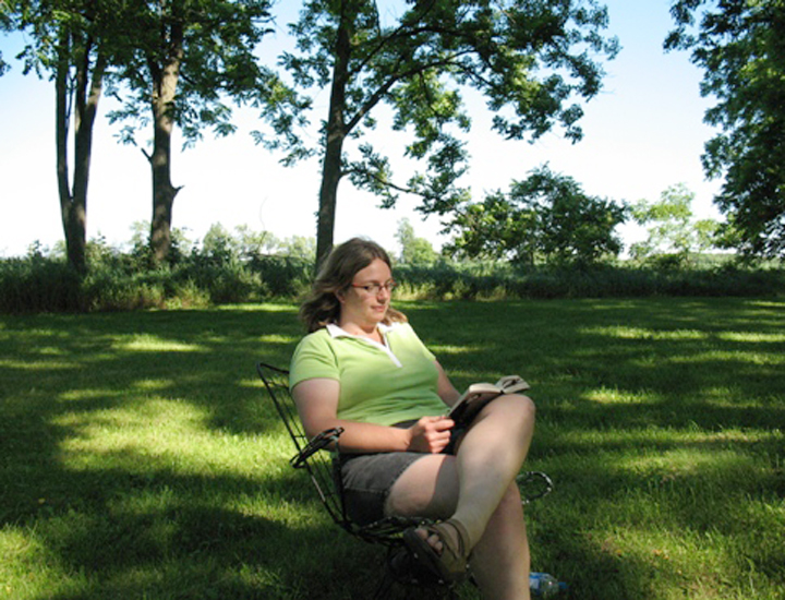 Professor Dawn Burns also spends her writing time among the trees of her family farm