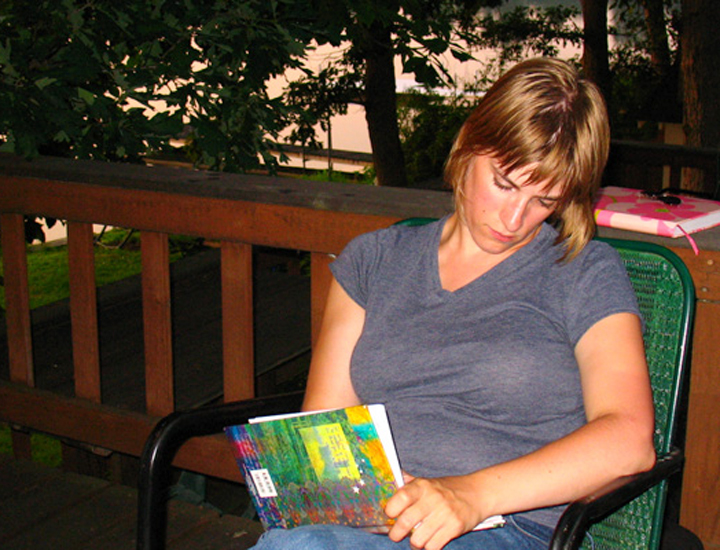 Rachel deep in journal writing