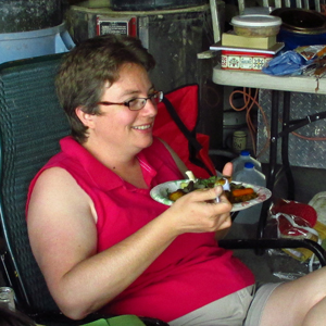 Plenty of food at SwampFire. Dawn Burns enjoying lunch.