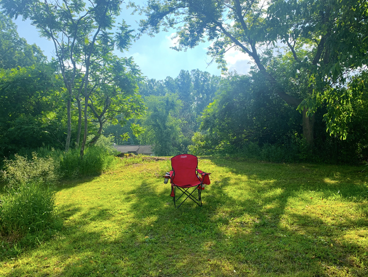 A camp chair just waitin' for someone to settle in for the late-afternoon view