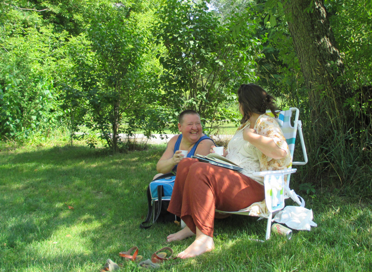 Bex can't help but laugh as she and Cait visit.