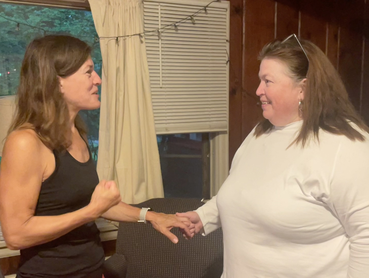 Tracie and Amy share a moment