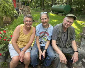 Dawn Burns, Bonnie Jo Campbell, and Christopher Magson just outside H House