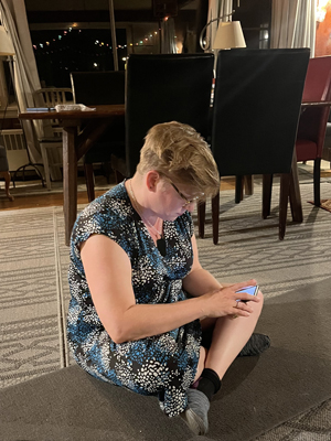 Rachel Baker sitting on the floor, deep in thought