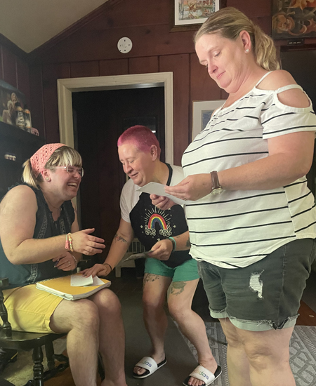 Robin signs her micro art pieces for Bex Miller and Michele Willman