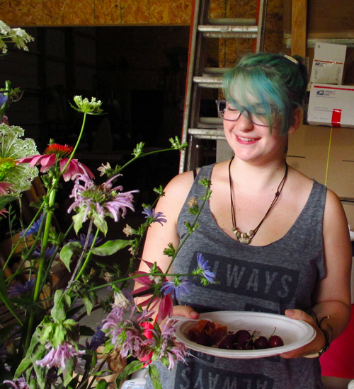 Zoe (Z) Anweiler fits in perfectly with the flowers on the breakfast table