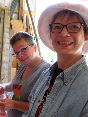 So what happens if the t-shirt
wrinkles in the press? Dawn Burns and Marian Plant during the logo printing session.