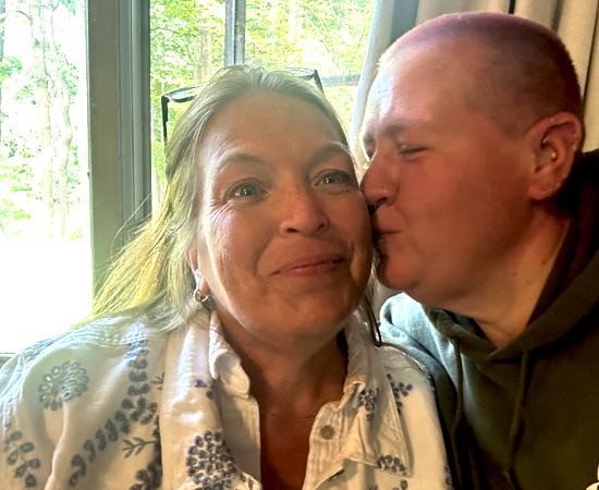 Amy gets a kiss from Bex